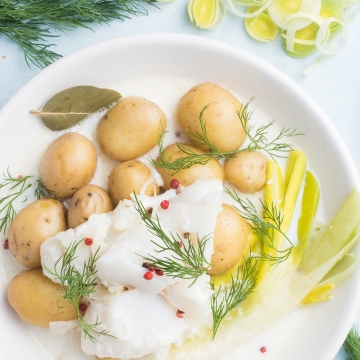 Poached cod and leeks